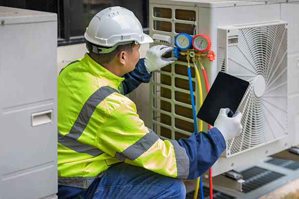 Professional Air Conditioning Repair technician working in Stanton, MI